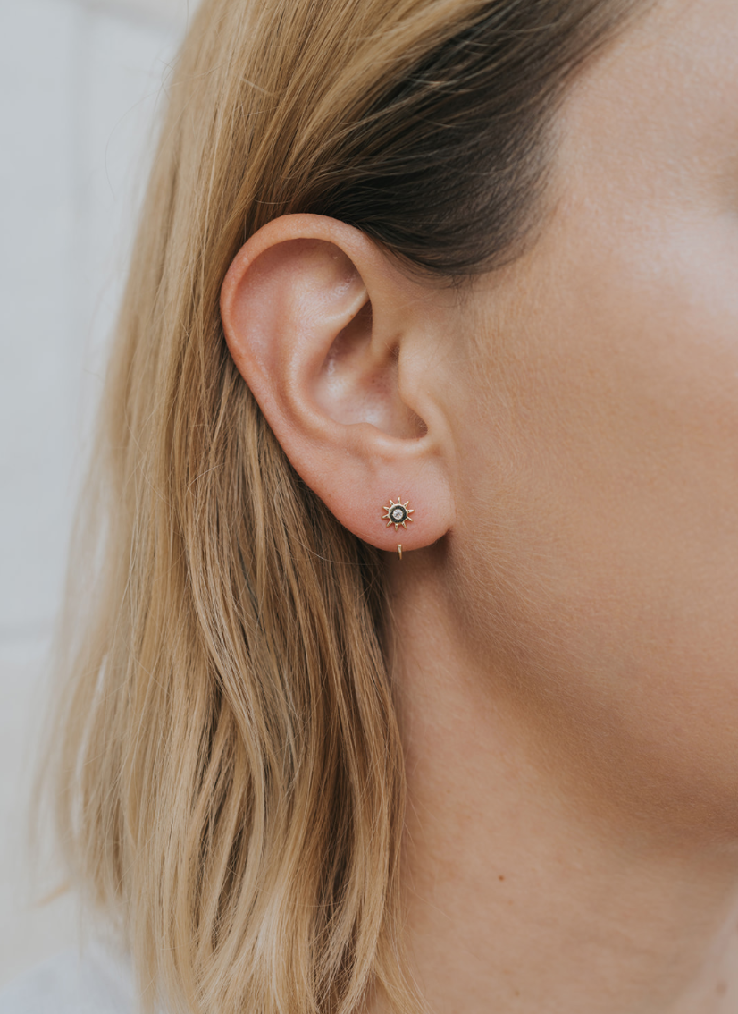 Gold Sun Icon Huggie Earrings