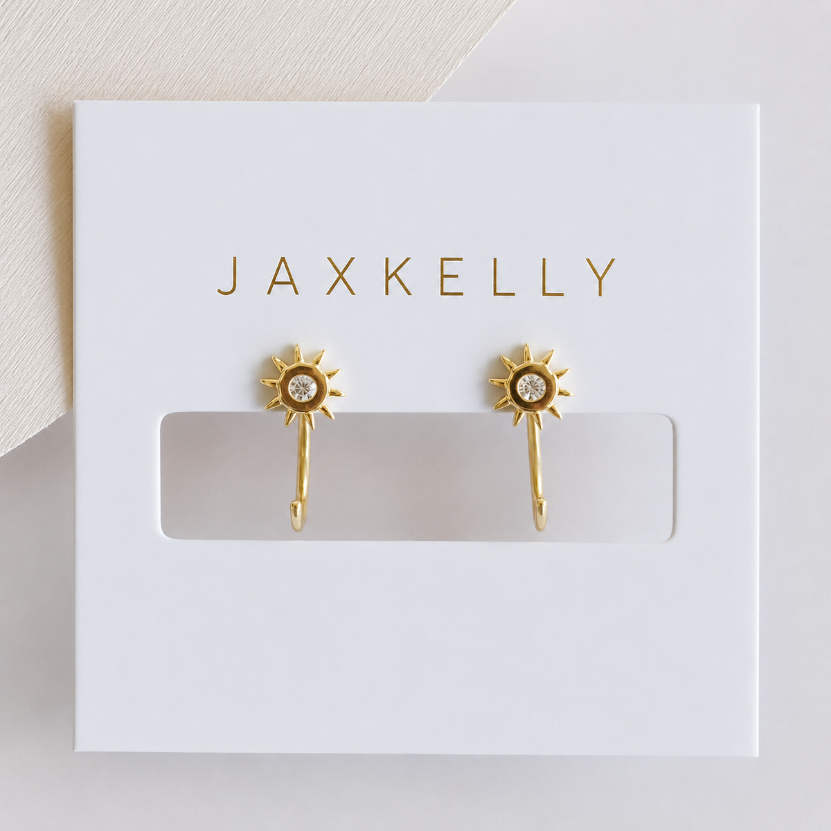 Gold Sun Icon Huggie Earrings
